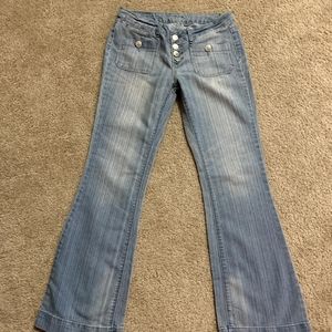 Light blue button fly flare jeans
